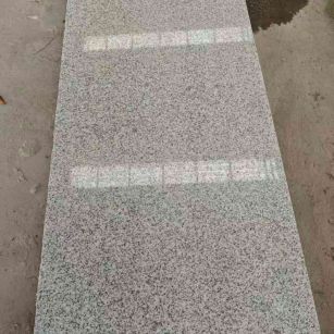 黄冈芝麻白光面毛板