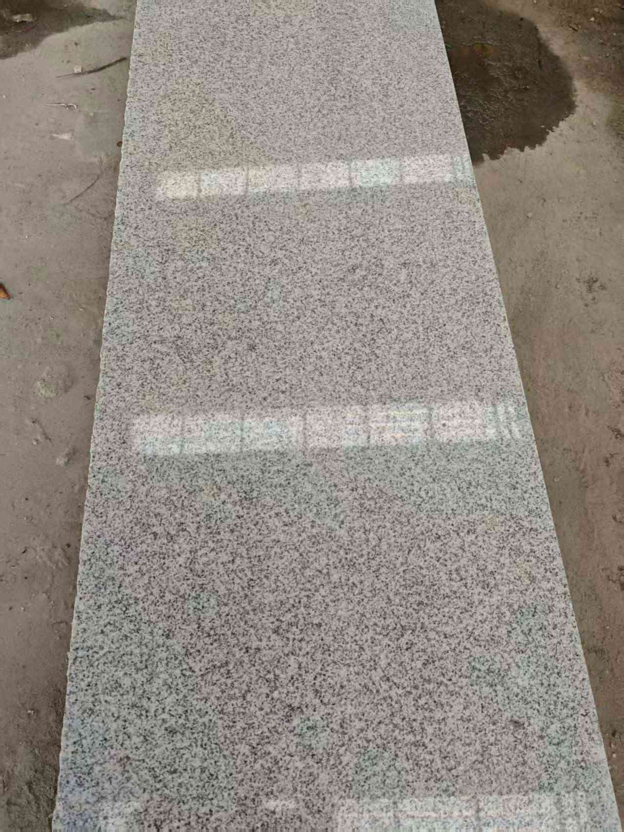 黄冈芝麻白光面毛板